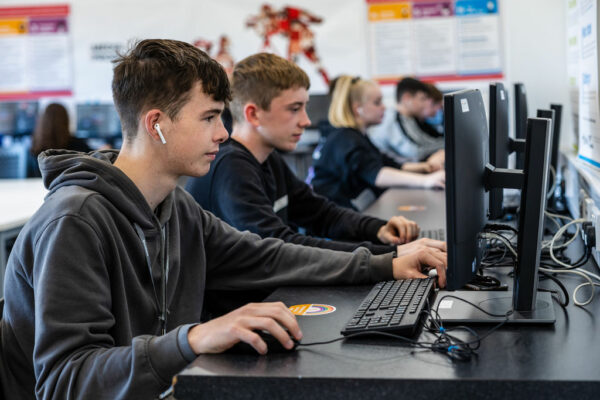 IT students sat at computers