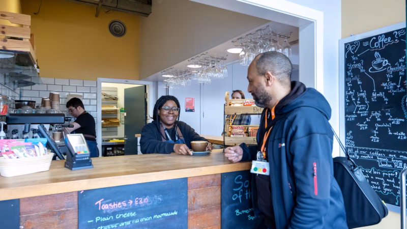 Students serving customers in the on-site café.