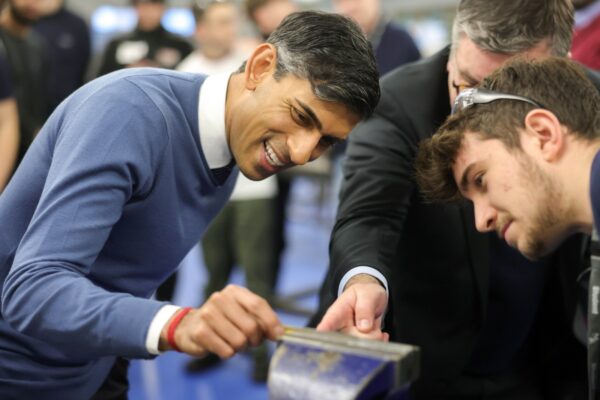 Prime Minister Rishi Sunak working with students at the Innovation and Technology Centre at the Chaffron Way campus.