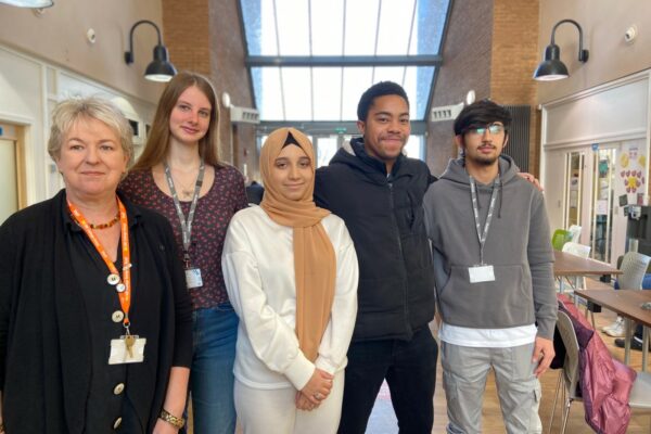 Sally Alexander, CEO and Group Principal of MK College Group, is stood next to the College's Student Commissioners for Racial Justice