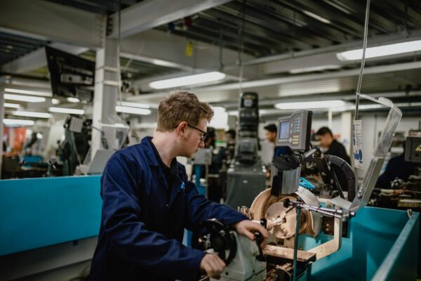 Students working in the engineering workshop at MK College