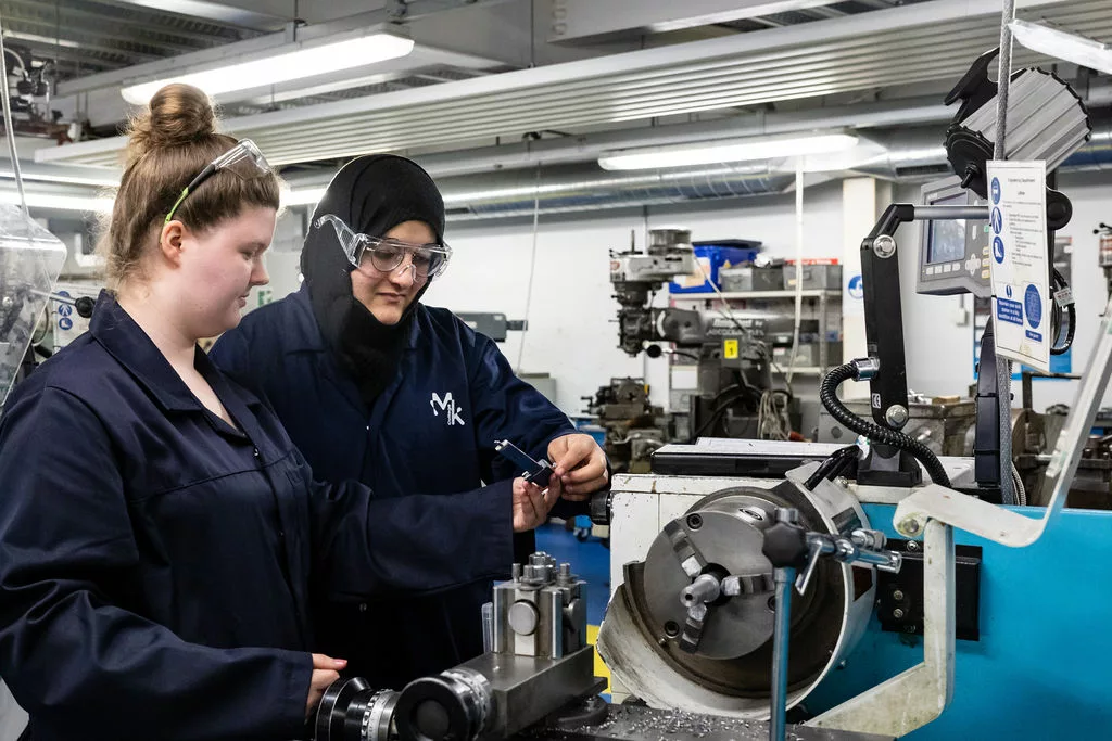 Female engineering students at work