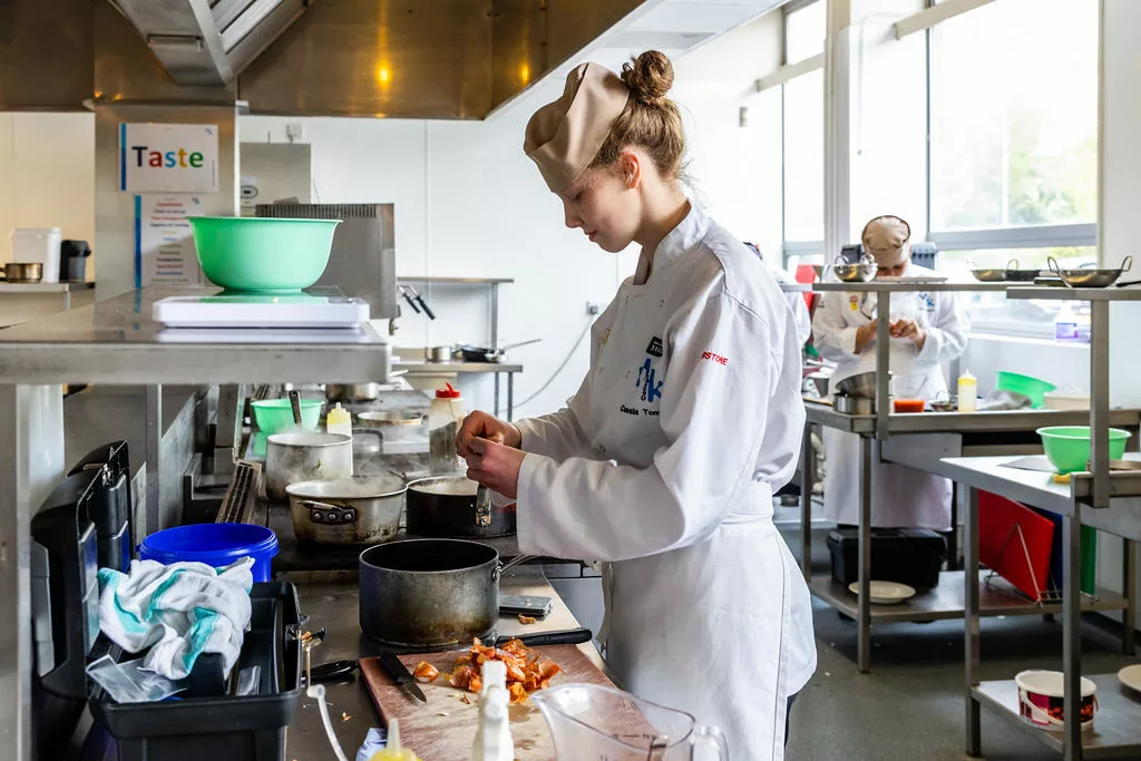 Female cookery students working in The Brasserie Restaurant