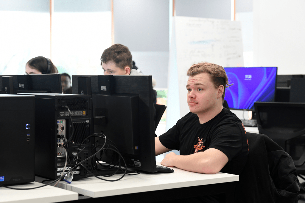 3 Students working on computers