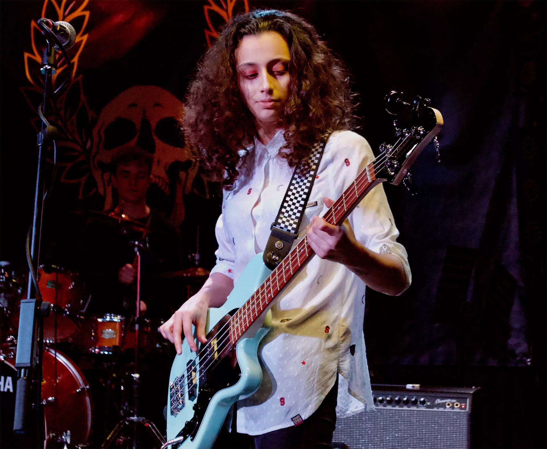 Music student playing a guitar