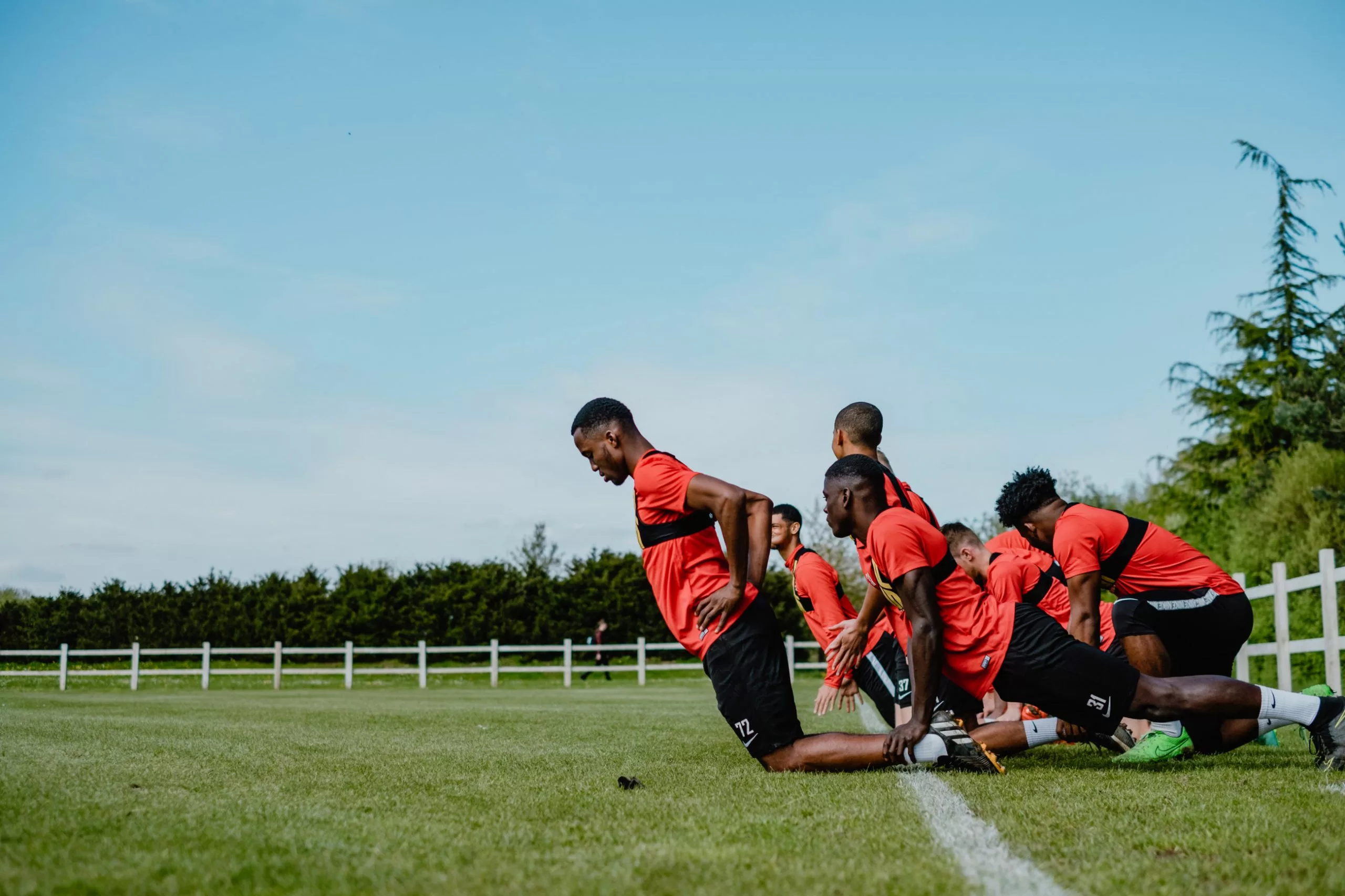 Sports students, playing a game of Football