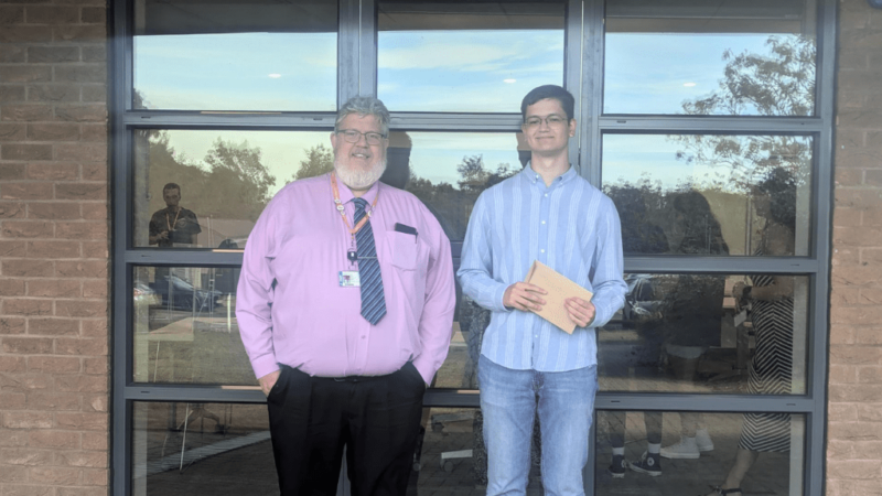 James Adi, student from MK College (left) with Head of Engineering and Construction, Clifford Clarke.