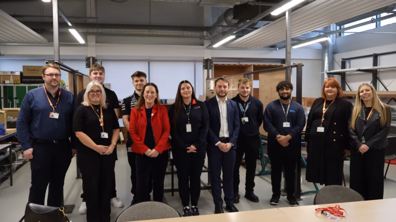 Emily Darlington MP and Chris Curtis MP with staff and apprentices at the ITC in November 2025