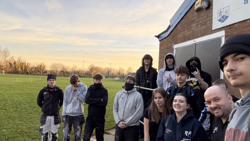 Painting & Decorating students outside Stony Stratford Town FC clubhouse