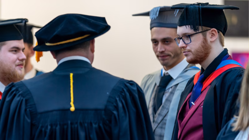 Students and staff at MK College's HE graduation