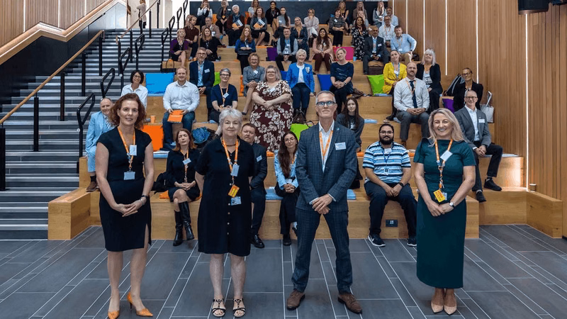 MK College Group's Executive Leadership Team in front of guests at the launch of the new Fairer Futures for All strategic plan.